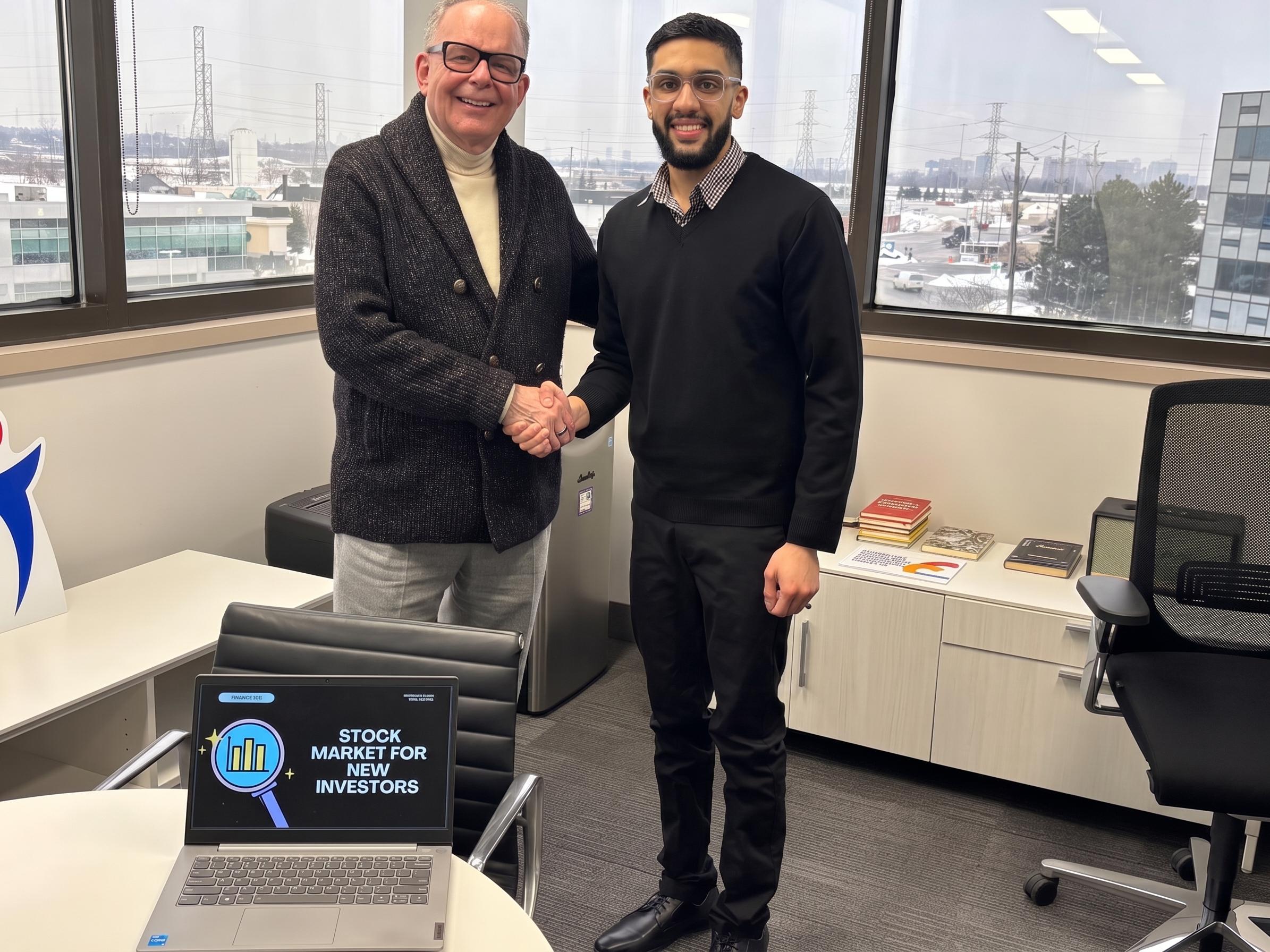 Vipul Sharma shaking hands with a business leader in an office.